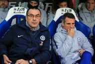 Zola (R) is currently Maurizio Sarri's assistant at Chelsea